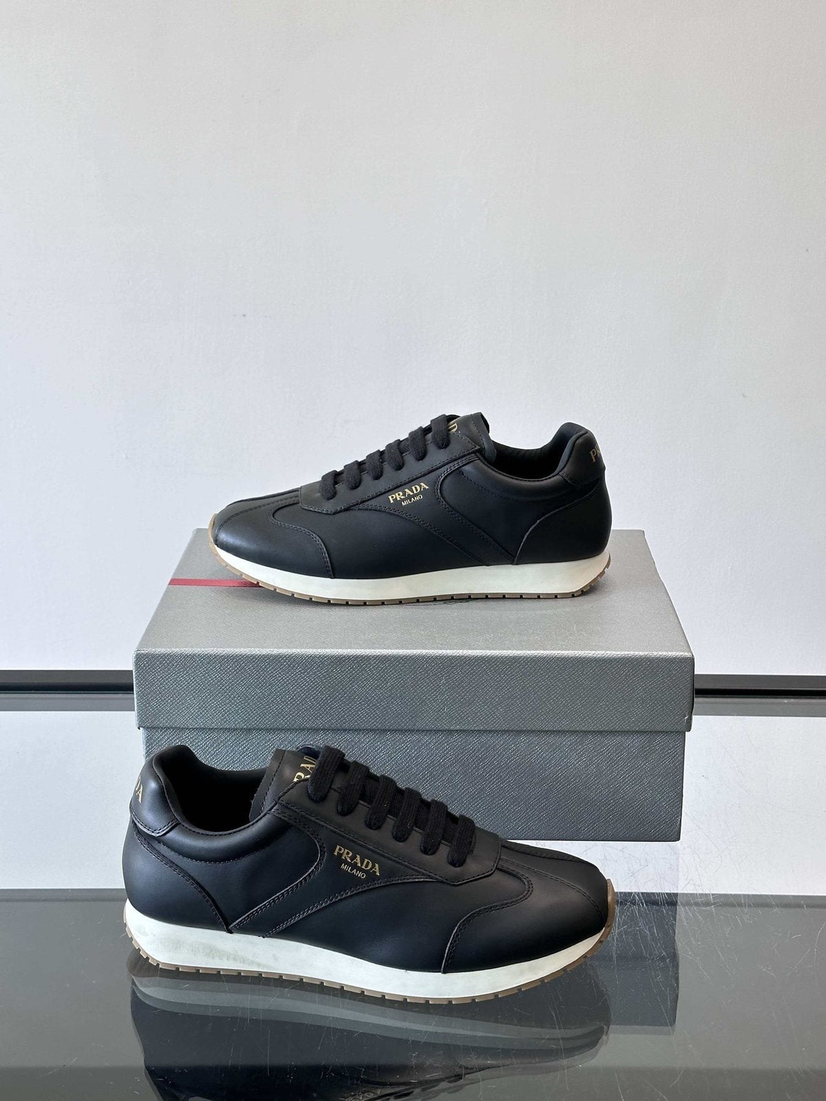 Prada Men's Black Low-Top Sneakers - Black Upper With White And Tan Accents