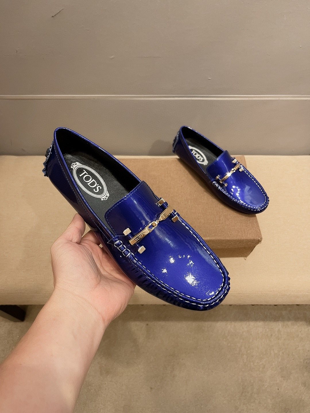 Tod's Glossy Metal Bar Loafers