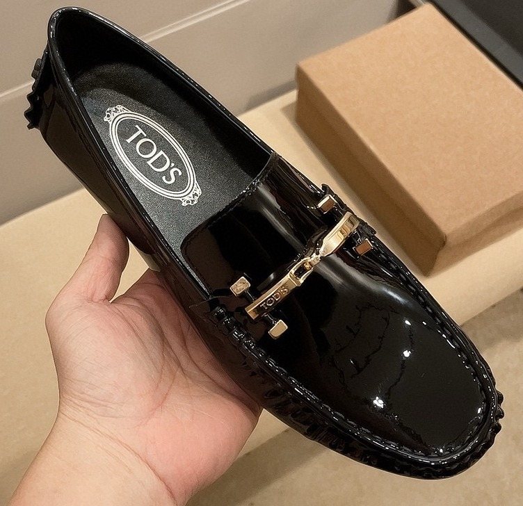 Tod's Glossy Metal Bar Loafers
